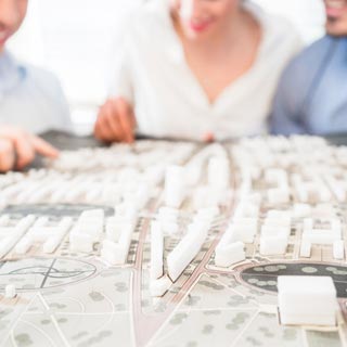 People examining a map of estates