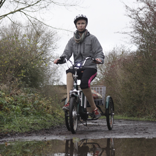 A person riding their bike