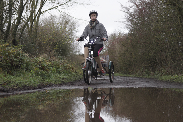 A person riding their bike 