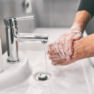 person washing hands