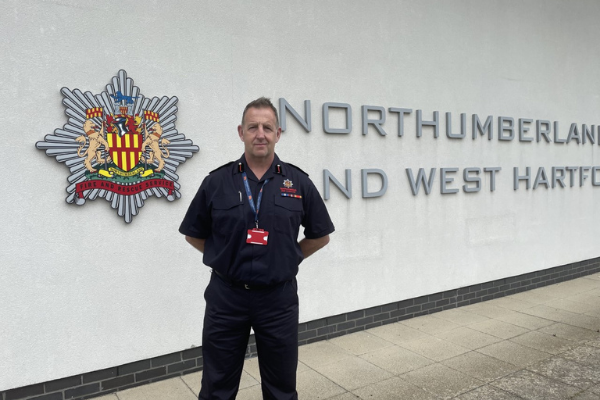 Jim McNeil in front of NFRS building