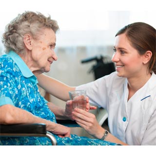 An elderly resident with a care worker