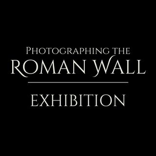 The words Photographing the Roman Wall Exhibition in white writing on a black background