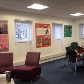 Photo of new area in Bedlington Library. Tables and Chairs
