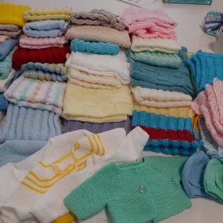 Knitted blankets and baby cardigans