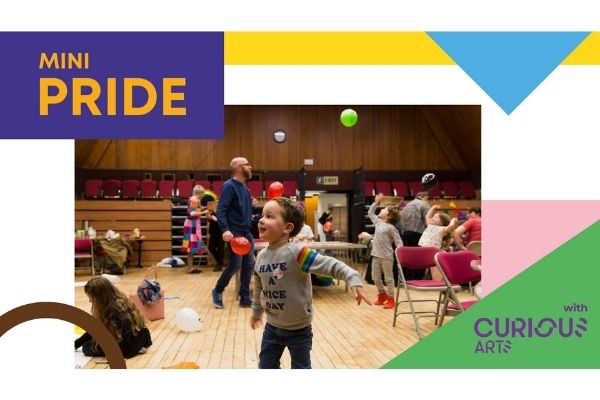 Photo of children playing with balloons with the text Mini Pride