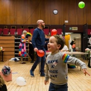 Photo of children playing with balloons