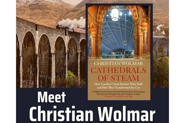 Image of a steam train with the cover of the book Cathedrals of Steam.