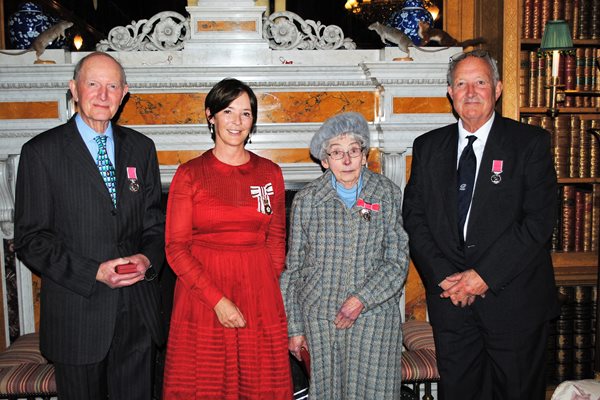 Image demonstrating Duchess presents British Empire Medals to dedicated residents