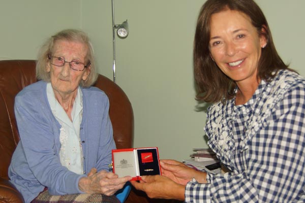 Duchess of Northumberland presenting the award to Mrs Hannah Crackett