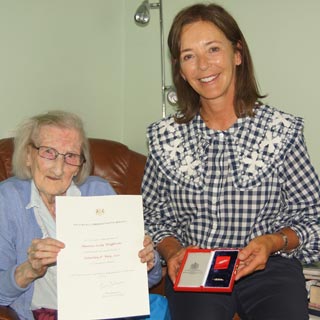 Duchess of Northumberland presenting the award to Mrs Hannah Crackett