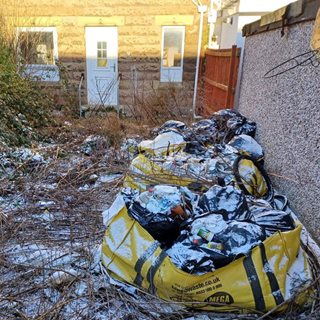 Image showing Residents fined for failing to clear up rubbish dumped in their gardens 