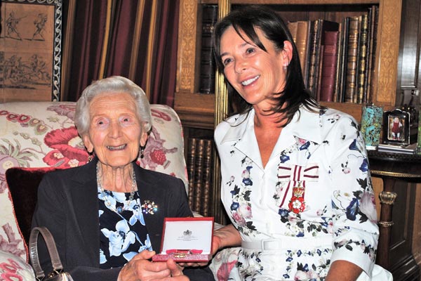Image demonstrating Duchess presents British Empire Medals to dedicated residents 