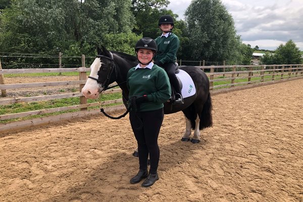 Image demonstrating Local RDA riders in the ribbons at National finals