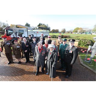 Members of the Armed Forces and emergency services at a Remembrance Service at County Hall, Morpeth