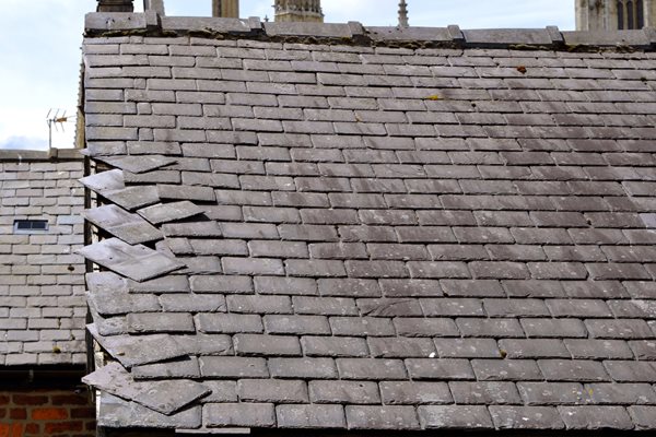 Image demonstrating Council removing loose roof slates in shopping centres 