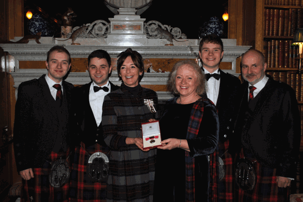 Image demonstrating Duchess presents British Empire Medal to dedicated Coquetdale resident 