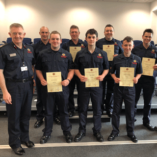 Image demonstrating New On-Call firefighter trainees complete their initial training