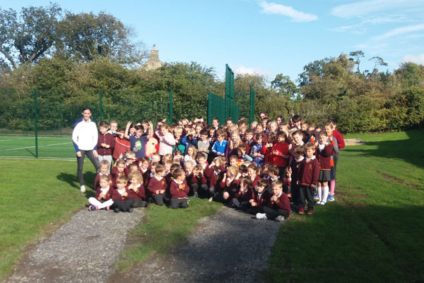 Image demonstrating Olympic runner opens new school track