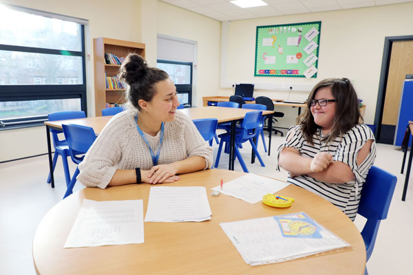 Teacher and student in a SEND school