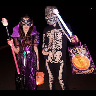 children dressed in Halloween costume