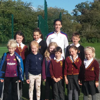 Image demonstrating Olympic runner opens new school track