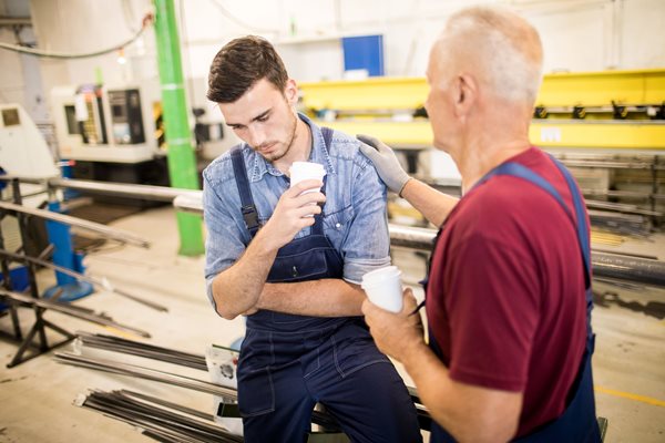 Photo of worker looking anxious