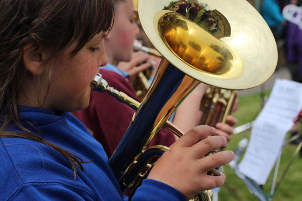 Young girl playing a tuba