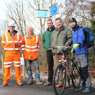 Councillors and railway staff on a new cycle track