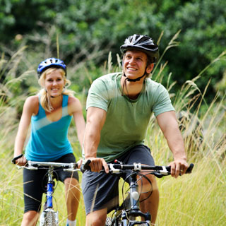 Couple riding bikes