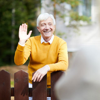 A neighbour waving