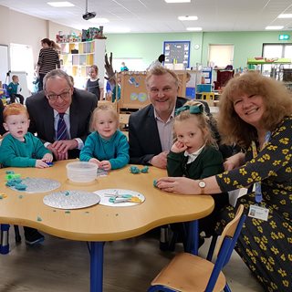 Cllr Wayne Daley and Dean Jackson with teachers in Bedlington