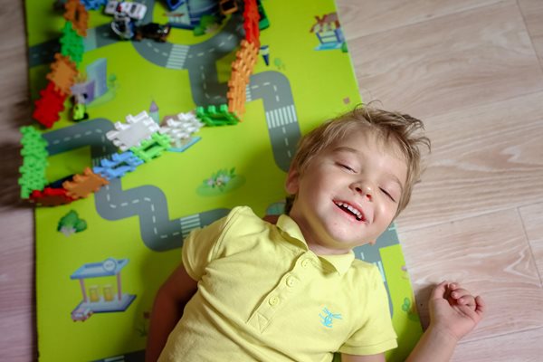 Child on playmat