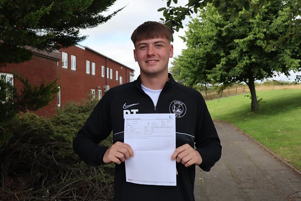 Student receiving A Level results 