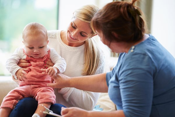 Health visitor and child