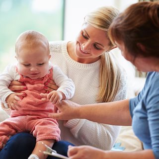 Health visitor and child