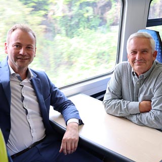 Cllrs Sanderson and Wearmouth seated on the special train