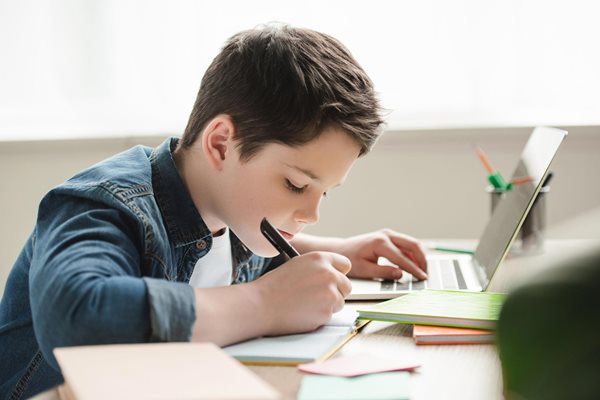 Child with laptop