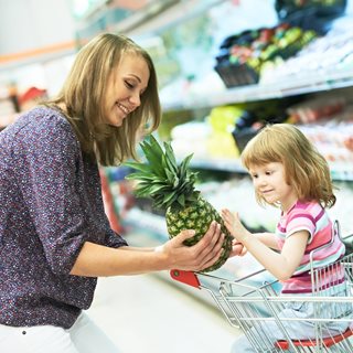 Mum and child food shopping