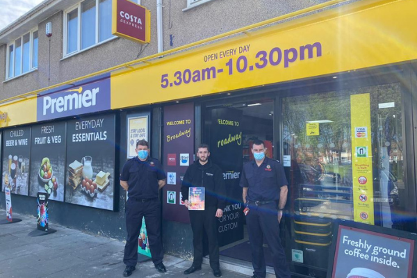 Fire crew outside store front