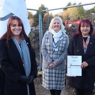 Executive Team with White Ribbon certificate