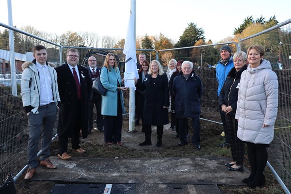 Councillors and Officers join to raise the White Ribbon Flag