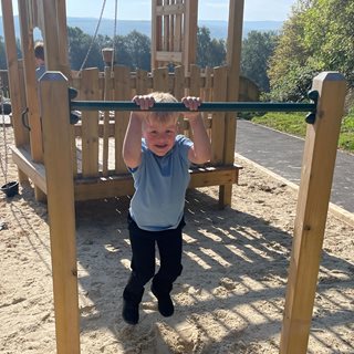 Boy playing on equipment