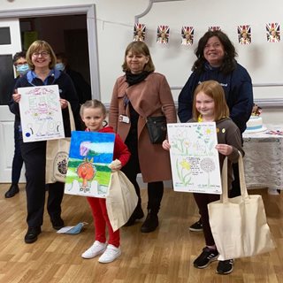 Poster winners with councillors and staff