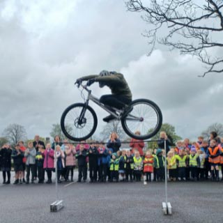 Pupils at Stannington First School enjoy a display by bicycle stunt team 3SIXTY after winning an active travel award
