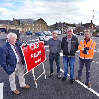 Councillors Jeff Watson, John Riddle, terry Clark and Highways Manager John Hunter at the new Turner Street carpark in Amble 