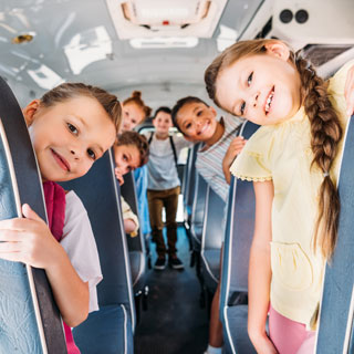 Children on a bus. A free child bus travel offer is running in the region over the holidays