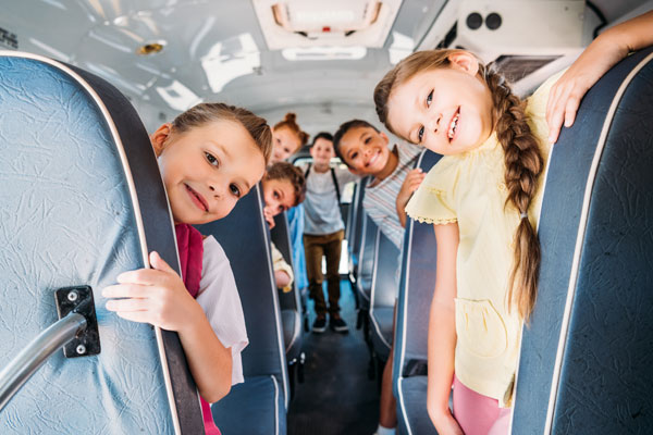 Children on a bus. A free child bus travel offer is running in the region over the holidays