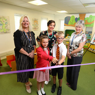 Interim Executive Director of Education at Northumberland County Council, Maureen Taylor, Illustrator, Liz Million and Head of Service for Libraries, Alison Peaden, with pupils from St Bede’s Catholic