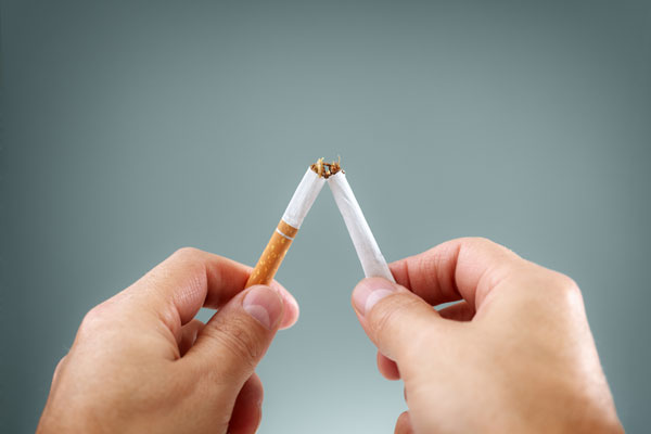 A cigarette being snapped. World No Smoking Day is on May 31